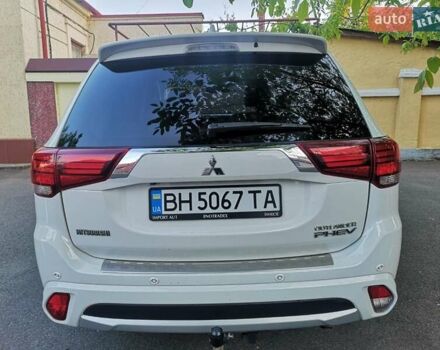 Білий Міцубісі Аутлендер, об'ємом двигуна 2 л та пробігом 185 тис. км за 19900 $, фото 1 на Automoto.ua
