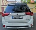 Білий Міцубісі Аутлендер, об'ємом двигуна 2 л та пробігом 185 тис. км за 19900 $, фото 1 на Automoto.ua