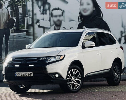 Белый Мицубиси Аутлендер, объемом двигателя 2.4 л и пробегом 147 тыс. км за 12999 $, фото 2 на Automoto.ua