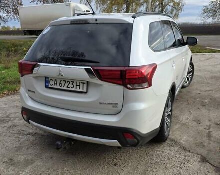 Белый Мицубиси Аутлендер, объемом двигателя 2.36 л и пробегом 169 тыс. км за 13300 $, фото 9 на Automoto.ua