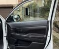 Белый Мицубиси Аутлендер, объемом двигателя 2 л и пробегом 168 тыс. км за 10800 $, фото 21 на Automoto.ua