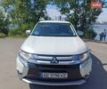 Белый Мицубиси Аутлендер, объемом двигателя 2.36 л и пробегом 145 тыс. км за 15200 $, фото 2 на Automoto.ua