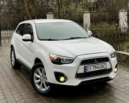 Белый Мицубиси Аутлендер, объемом двигателя 2 л и пробегом 168 тыс. км за 10800 $, фото 1 на Automoto.ua
