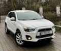Белый Мицубиси Аутлендер, объемом двигателя 2 л и пробегом 168 тыс. км за 10800 $, фото 1 на Automoto.ua