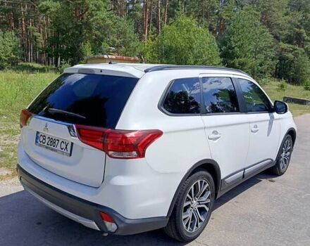 Белый Мицубиси Аутлендер, объемом двигателя 2.36 л и пробегом 142 тыс. км за 15100 $, фото 3 на Automoto.ua