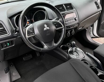 Белый Мицубиси Аутлендер, объемом двигателя 2 л и пробегом 168 тыс. км за 10800 $, фото 11 на Automoto.ua