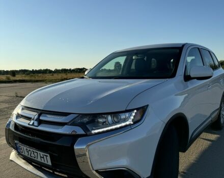 Белый Мицубиси Аутлендер, объемом двигателя 2.4 л и пробегом 91 тыс. км за 15900 $, фото 2 на Automoto.ua