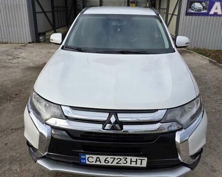 Белый Мицубиси Аутлендер, объемом двигателя 2.36 л и пробегом 169 тыс. км за 13300 $, фото 5 на Automoto.ua