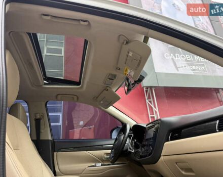 Белый Мицубиси Аутлендер, объемом двигателя 2.4 л и пробегом 159 тыс. км за 16700 $, фото 23 на Automoto.ua