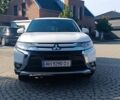 Белый Мицубиси Аутлендер, объемом двигателя 2.4 л и пробегом 190 тыс. км за 12000 $, фото 2 на Automoto.ua