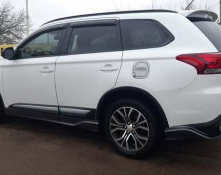 Белый Мицубиси Аутлендер, объемом двигателя 2.4 л и пробегом 240 тыс. км за 14900 $, фото 5 на Automoto.ua