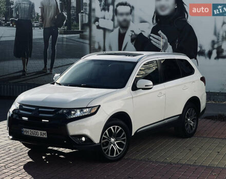 Белый Мицубиси Аутлендер, объемом двигателя 2.4 л и пробегом 147 тыс. км за 12999 $, фото 4 на Automoto.ua
