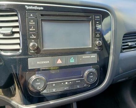 Белый Мицубиси Аутлендер, объемом двигателя 2.36 л и пробегом 142 тыс. км за 15100 $, фото 10 на Automoto.ua