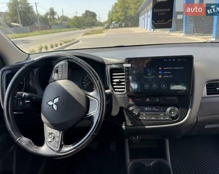 Белый Мицубиси Аутлендер, объемом двигателя 2.4 л и пробегом 91 тыс. км за 14900 $, фото 8 на Automoto.ua