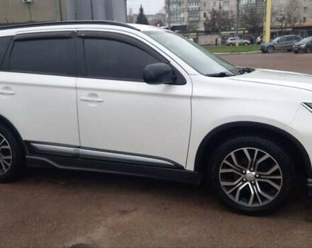 Белый Мицубиси Аутлендер, объемом двигателя 2.4 л и пробегом 240 тыс. км за 14900 $, фото 7 на Automoto.ua