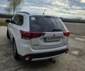 Белый Мицубиси Аутлендер, объемом двигателя 2.36 л и пробегом 169 тыс. км за 13300 $, фото 2 на Automoto.ua