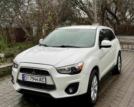 Белый Мицубиси Аутлендер, объемом двигателя 2 л и пробегом 168 тыс. км за 10800 $, фото 2 на Automoto.ua