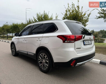 Белый Мицубиси Аутлендер, объемом двигателя 2.4 л и пробегом 159 тыс. км за 16700 $, фото 6 на Automoto.ua