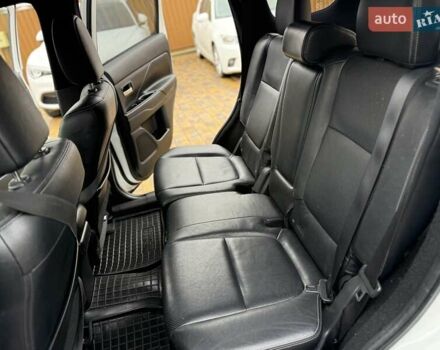 Белый Мицубиси Аутлендер, объемом двигателя 2.36 л и пробегом 191 тыс. км за 13950 $, фото 25 на Automoto.ua