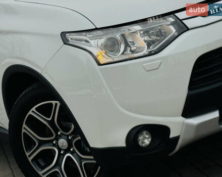 Белый Мицубиси Аутлендер, объемом двигателя 2.2 л и пробегом 140 тыс. км за 16200 $, фото 6 на Automoto.ua