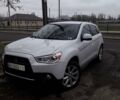 Білий Міцубісі Аутлендер, об'ємом двигуна 2 л та пробігом 89 тис. км за 14000 $, фото 1 на Automoto.ua