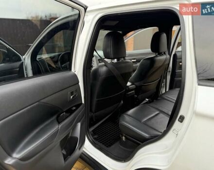 Белый Мицубиси Аутлендер, объемом двигателя 2.36 л и пробегом 191 тыс. км за 13950 $, фото 26 на Automoto.ua