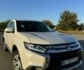 Белый Мицубиси Аутлендер, объемом двигателя 2.4 л и пробегом 91 тыс. км за 15900 $, фото 1 на Automoto.ua