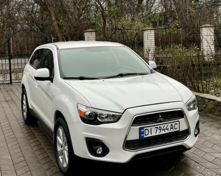 Белый Мицубиси Аутлендер, объемом двигателя 2 л и пробегом 168 тыс. км за 10800 $, фото 3 на Automoto.ua
