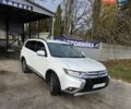 Белый Мицубиси Аутлендер, объемом двигателя 2.36 л и пробегом 169 тыс. км за 13300 $, фото 12 на Automoto.ua