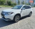 Белый Мицубиси Аутлендер, объемом двигателя 2.36 л и пробегом 145 тыс. км за 15200 $, фото 1 на Automoto.ua