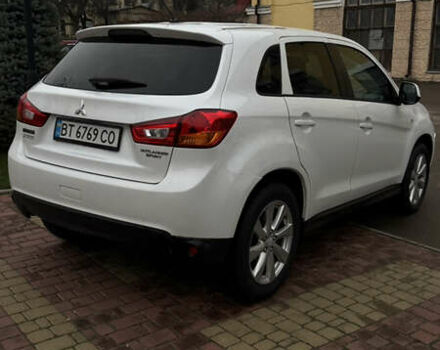 Белый Мицубиси Аутлендер, объемом двигателя 2 л и пробегом 161 тыс. км за 9200 $, фото 3 на Automoto.ua