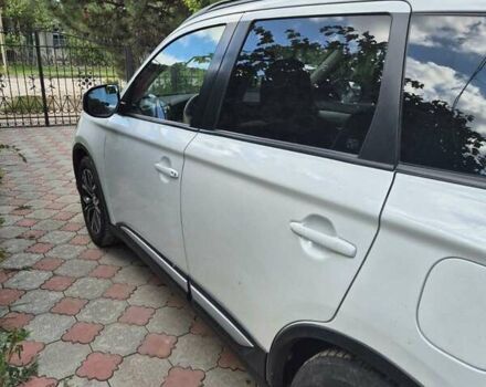 Білий Міцубісі Аутлендер, об'ємом двигуна 2.36 л та пробігом 133 тис. км за 14200 $, фото 3 на Automoto.ua