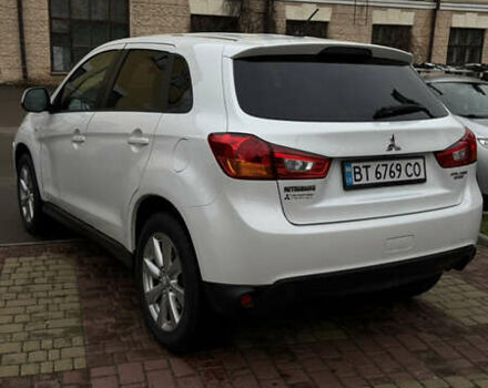 Белый Мицубиси Аутлендер, объемом двигателя 2 л и пробегом 161 тыс. км за 9200 $, фото 5 на Automoto.ua