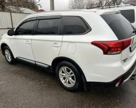 Белый Мицубиси Аутлендер, объемом двигателя 3 л и пробегом 175 тыс. км за 13100 $, фото 3 на Automoto.ua