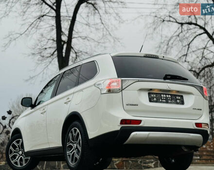 Белый Мицубиси Аутлендер, объемом двигателя 2.2 л и пробегом 140 тыс. км за 16200 $, фото 17 на Automoto.ua