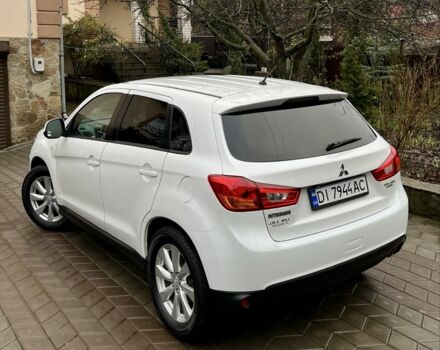 Белый Мицубиси Аутлендер, объемом двигателя 2 л и пробегом 168 тыс. км за 10800 $, фото 5 на Automoto.ua