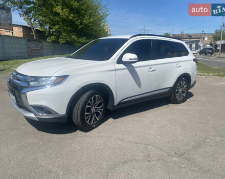 Білий Міцубісі Аутлендер, об'ємом двигуна 2.36 л та пробігом 159 тис. км за 15500 $, фото 2 на Automoto.ua
