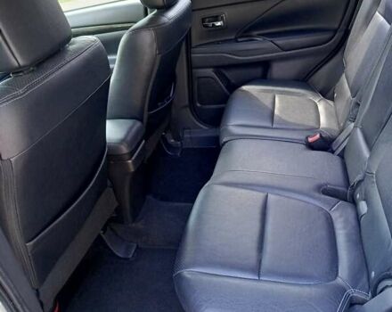 Белый Мицубиси Аутлендер, объемом двигателя 2.36 л и пробегом 142 тыс. км за 15100 $, фото 7 на Automoto.ua