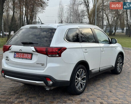 Белый Мицубиси Аутлендер, объемом двигателя 3 л и пробегом 310 тыс. км за 12700 $, фото 29 на Automoto.ua