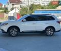 Белый Мицубиси Аутлендер, объемом двигателя 2.36 л и пробегом 185 тыс. км за 14200 $, фото 4 на Automoto.ua