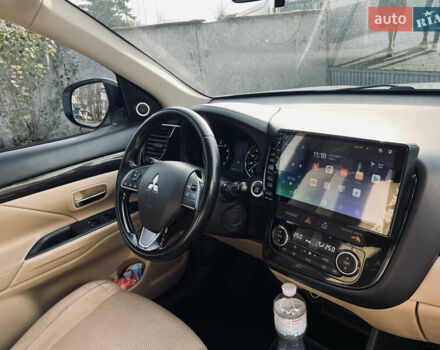 Белый Мицубиси Аутлендер, объемом двигателя 2.4 л и пробегом 147 тыс. км за 12999 $, фото 38 на Automoto.ua