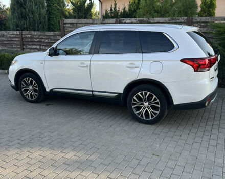 Белый Мицубиси Аутлендер, объемом двигателя 3 л и пробегом 197 тыс. км за 15500 $, фото 17 на Automoto.ua