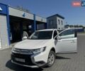 Белый Мицубиси Аутлендер, объемом двигателя 2.4 л и пробегом 91 тыс. км за 14900 $, фото 2 на Automoto.ua