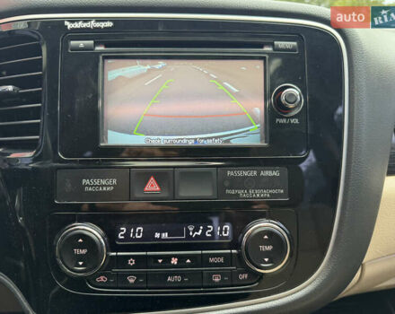 Белый Мицубиси Аутлендер, объемом двигателя 2.4 л и пробегом 159 тыс. км за 16999 $, фото 46 на Automoto.ua