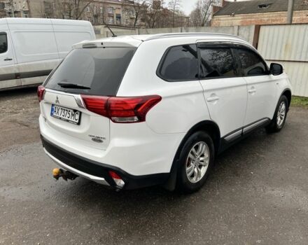 Белый Мицубиси Аутлендер, объемом двигателя 3 л и пробегом 175 тыс. км за 13100 $, фото 1 на Automoto.ua