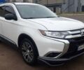 Белый Мицубиси Аутлендер, объемом двигателя 2.4 л и пробегом 240 тыс. км за 14900 $, фото 1 на Automoto.ua