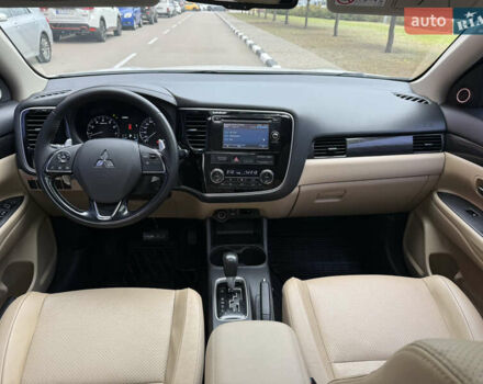 Белый Мицубиси Аутлендер, объемом двигателя 2.4 л и пробегом 160 тыс. км за 16500 $, фото 43 на Automoto.ua