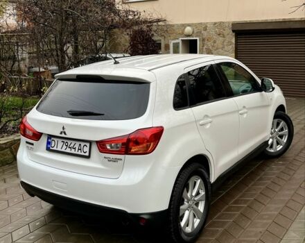 Белый Мицубиси Аутлендер, объемом двигателя 2 л и пробегом 168 тыс. км за 10800 $, фото 6 на Automoto.ua