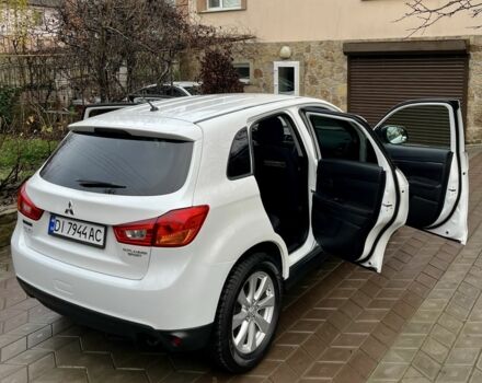 Белый Мицубиси Аутлендер, объемом двигателя 2 л и пробегом 168 тыс. км за 10800 $, фото 8 на Automoto.ua