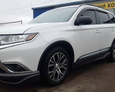 Белый Мицубиси Аутлендер, объемом двигателя 2.4 л и пробегом 240 тыс. км за 14900 $, фото 2 на Automoto.ua